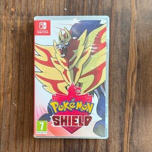 Nintendo Pokémon Shield Game - Red and Yellow Cover